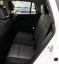 dodge caliber 2009 white hatchback sxt gasoline 4 cylinders front wheel drive automatic 07702