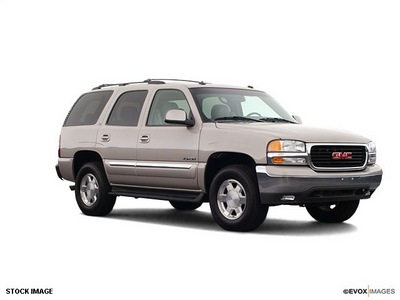 gmc yukon 2004 white suv slt gasoline 8 cylinders rear wheel drive automatic with overdrive 77388