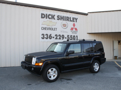 jeep commander 2006 black suv gasoline 6 cylinders 4 wheel drive automatic 27215