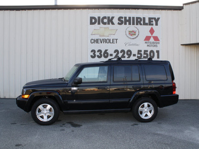 jeep commander 2006 black suv gasoline 6 cylinders 4 wheel drive automatic 27215