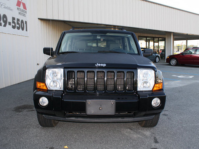 jeep commander 2006 black suv gasoline 6 cylinders 4 wheel drive automatic 27215