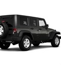 jeep wrangler unlimited 2010 dk  gray suv sport gasoline 6 cylinders 4 wheel drive 6 speed manual 45342