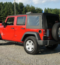 jeep wrangler unlimited 2009 red suv x gasoline 6 cylinders 2 wheel drive automatic 27569
