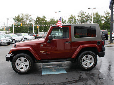 jeep wrangler 2008 red rock suv sahara gasoline 6 cylinders 4 wheel drive automatic with overdrive 07701