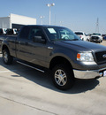 ford f 150 2006 dk  gray xlt flex fuel 8 cylinders 4 wheel drive automatic with overdrive 76108