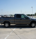 ford f 150 2006 dk  gray xlt flex fuel 8 cylinders 4 wheel drive automatic with overdrive 76108