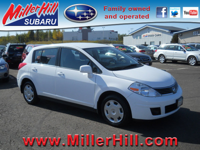 nissan versa 2008 white hatchback s gasoline 4 cylinders front wheel drive automatic 55811