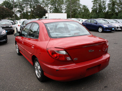 kia rio 2002 red sedan gasoline 4 cylinders front wheel drive automatic with overdrive 07702