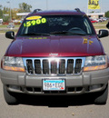 jeep grand cherokee 2002 dk  red suv laredo 4wd gasoline 6 cylinders 4 wheel drive automatic with overdrive 56001