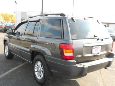 jeep grand cherokee 2004 gray suv gasoline 6 cylinders rear wheel drive 4 speed automatic 43228