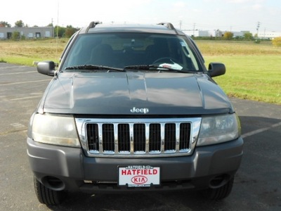 jeep grand cherokee 2004 gray suv gasoline 6 cylinders rear wheel drive 4 speed automatic 43228