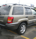 jeep grand cherokee 2004 gold suv laredo gasoline 6 cylinders 4 wheel drive automatic with overdrive 13502