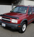 chevrolet tracker 2001 red suv gasoline 4 cylinders 4 wheel drive automatic with overdrive 98371