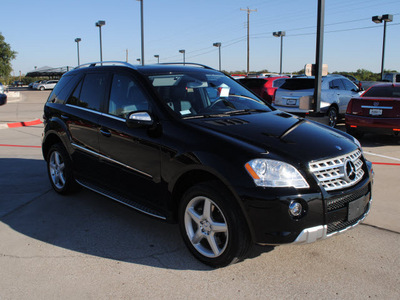 mercedes benz m class 2009 black suv ml550 gasoline 8 cylinders all whee drive automatic 76087