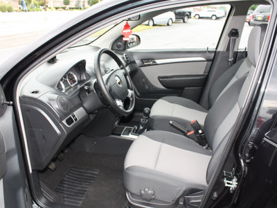 chevrolet aveo 2011 black hatchback aveo5 ls gasoline 4 cylinders front wheel drive 5 speed manual 07730