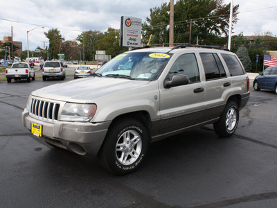 jeep grand cherokee 2004 tan suv laredo gasoline 6 cylinders 4 wheel drive automatic with overdrive 07730