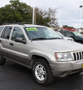 jeep grand cherokee 2004 tan suv laredo gasoline 6 cylinders 4 wheel drive automatic with overdrive 07730