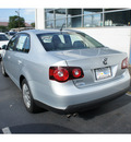 volkswagen jetta 2009 silver sedan s pzev gasoline 5 cylinders front wheel drive automatic 08016