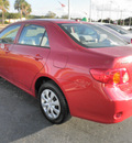 toyota corolla 2010 red sedan le gasoline 4 cylinders front wheel drive automatic 34474
