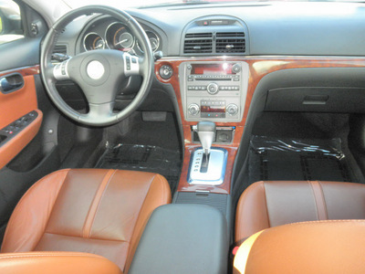 saturn aura 2007 brown sedan xr gasoline 6 cylinders front wheel drive automatic 34474