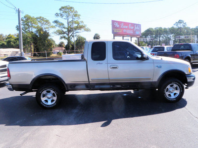 ford f 150 1999 gold lariat gasoline v8 4 wheel drive automatic with overdrive 32401