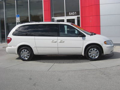 chrysler town country 2006 white van limited gasoline 6 cylinders front wheel drive automatic 33884