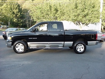 dodge ram pickup 1500 2002 black pickup truck slt gasoline 8 cylinders 4 wheel drive 06019