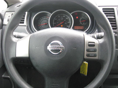 nissan versa 2010 black hatchback gasoline 4 cylinders front wheel drive automatic 33884
