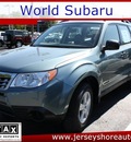 subaru forester 2011 lt  green 2 5x gasoline 4 cylinders all whee drive 5 speed manual 07701