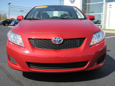 toyota corolla 2009 red sedan le gasoline 4 cylinders front wheel drive automatic 46410