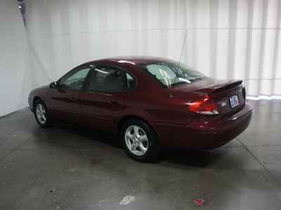 ford taurus 2004 maroon sedan se gasoline 6 cylinders front wheel drive automatic with overdrive 76108