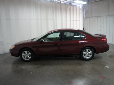 ford taurus 2004 maroon sedan se gasoline 6 cylinders front wheel drive automatic with overdrive 76108