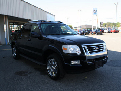 ford explorer sport trac 2010 black suv limited gasoline 8 cylinders 4 wheel drive automatic 27215