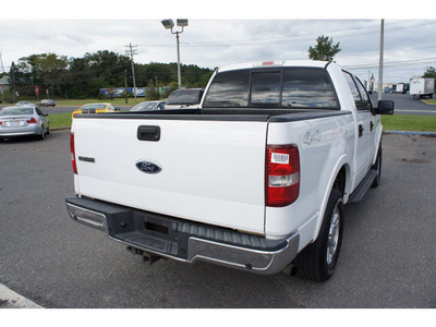 ford f 150 2004 oxford white lariat gasoline 8 cylinders 4 wheel drive automatic with overdrive 07712