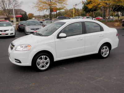 chevrolet aveo 2011 white sedan lt gasoline 4 cylinders front wheel drive automatic 55124