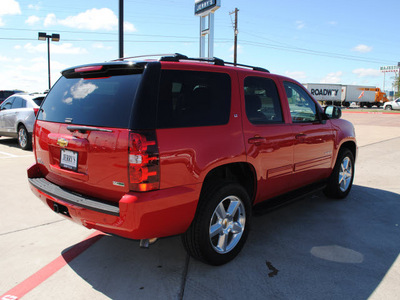 chevrolet tahoe 2011 red suv lt flex fuel 8 cylinders 2 wheel drive automatic 76087