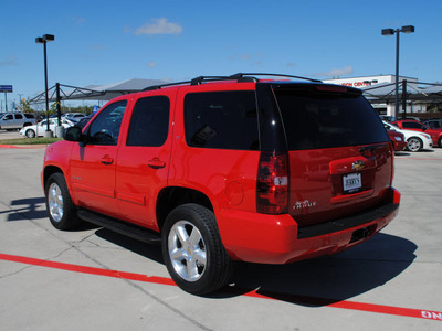 chevrolet tahoe 2011 red suv lt flex fuel 8 cylinders 2 wheel drive automatic 76087