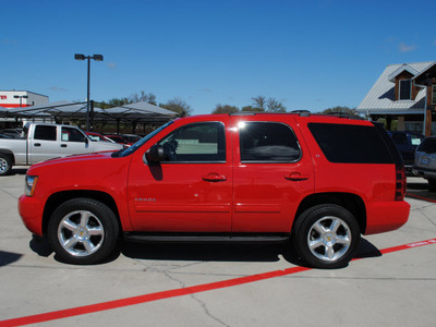chevrolet tahoe 2011 red suv lt flex fuel 8 cylinders 2 wheel drive automatic 76087