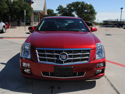 cadillac sts 2011 red sedan gasoline 6 cylinders rear wheel drive automatic 76087