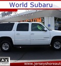 gmc yukon xl 2001 white suv 2500 slt gasoline 8 cylinders 4 wheel drive automatic with overdrive 07701