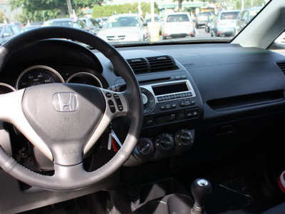 honda fit 2008 blaze orange hatchback sport gasoline 4 cylinders front wheel drive 5 speed manual 07701