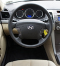 hyundai sonata 2009 tan sedan gls gasoline 4 cylinders front wheel drive automatic 76018