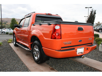 ford explorer sport trac 2004 orange suv adrenalin flex fuel 6 cylinders 4 wheel drive automatic 99352