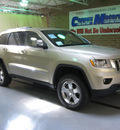 jeep grand cherokee 2012 white gold suv overland gasoline 6 cylinders 4 wheel drive automatic 44883