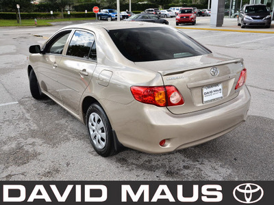 toyota corolla 2009 gold sedan le gasoline 4 cylinders front wheel drive automatic 32771