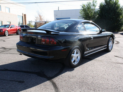 ford mustang 1998 black coupe gasoline v6 rear wheel drive 5 speed manual 80229