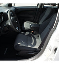 dodge caliber 2009 white hatchback sxt gasoline 4 cylinders front wheel drive automatic 77388