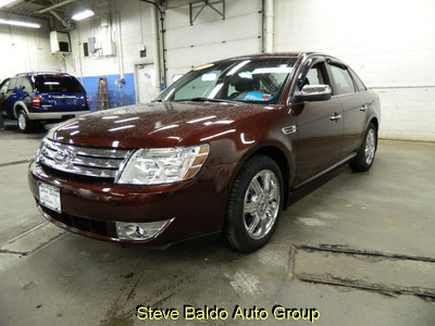 ford taurus 2009 red sedan limited gasoline 6 cylinders front wheel drive automatic 14304