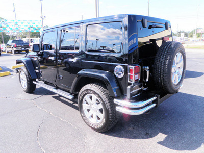 jeep wrangler unlimited 2011 black suv 70th anniversary gasoline 6 cylinders 4 wheel drive automatic 32401