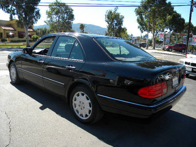 mercedes benz e class 1999 black sedan e320 gasoline 6 cylinders rear wheel drive automatic 92882